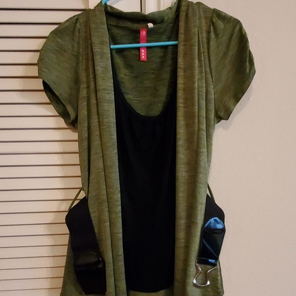 Green blouse with black belt